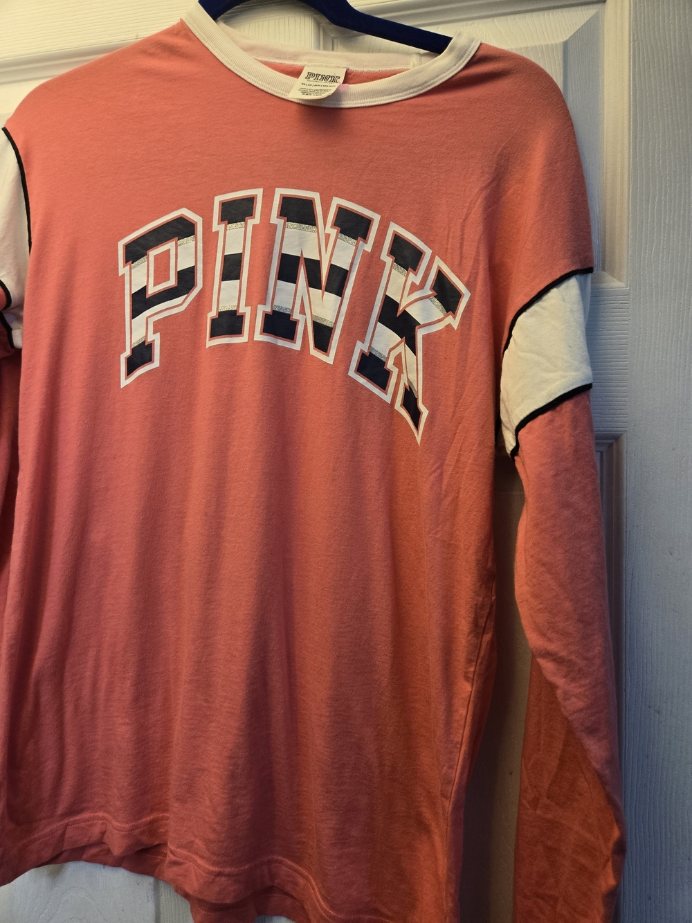 NWOT PINK Long Sleeve Coral Tshirt With Black, Silver, & White Lettering
